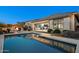 Backyard pool reflecting the home's architecture and the outdoor seating area at 2046 N Red Clf, Mesa, AZ 85207