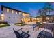 Backyard with patio, seating area, and lush landscaping; a perfect outdoor space for relaxing and entertaining on summer days at 28826 N 67Th Dr, Peoria, AZ 85383