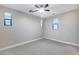 Neutral bedroom featuring plush carpeting, recessed lighting, and multiple windows at 28826 N 67Th Dr, Peoria, AZ 85383