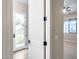 View of the mudroom featuring a white exterior door and light tile floors at 28826 N 67Th Dr, Peoria, AZ 85383