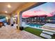 Relaxing pool with pergola and waterfall features surrounded by manicured landscaping at 28826 N 67Th Dr, Peoria, AZ 85383