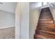 View of a staircase featuring wood stairs and a view to the second story at 28826 N 67Th Dr, Peoria, AZ 85383