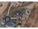 Stunning aerial view of a property boasting a backyard pool, putting green, and desert landscaping at 297 W Chase St, San Tan Valley, AZ 85143