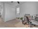 Bedroom featuring a desk area and a closet with sliding doors at 297 W Chase St, San Tan Valley, AZ 85143