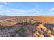 Expansive vista highlighting a desert landscape and residential area against a clear, blue sky at 297 W Chase St, San Tan Valley, AZ 85143