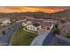 Stunning exterior elevation of the home features desert landscaping and solar panels at 297 W Chase St, San Tan Valley, AZ 85143