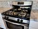 Stainless steel oven with gas cooktop and white cabinets at 3328 W Charter Oak Rd, Phoenix, AZ 85029