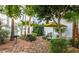 Serene backyard patio area with a grill, table, chairs, and lush greenery at 3416 N 44Th St # 70, Phoenix, AZ 85018