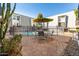 Charming patio area with outdoor seating and shared community pool access at 3416 N 44Th St # 70, Phoenix, AZ 85018