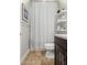 Compact bathroom featuring a vanity, toilet, and a shower with a patterned curtain at 3519 E Appaloosa Rd, Gilbert, AZ 85296