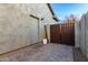 Exterior view of a side gate and back door to the home at 3519 E Appaloosa Rd, Gilbert, AZ 85296