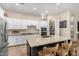 Spacious kitchen featuring white cabinets, stainless appliances, and large island at 3519 E Appaloosa Rd, Gilbert, AZ 85296