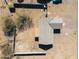 Birds-eye view of the home, illustrating its roofline, yard, and nearby road at 3545 N Hohokam Dr, Eloy, AZ 85131