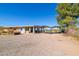 Single-story home featuring a carport and desert landscaping at 417 W Sunset Dr, Mammoth, AZ 85618