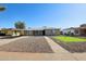 Charming single-story home featuring a gravel yard and carport at 4235 N 16Th Dr, Phoenix, AZ 85015