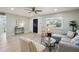 Inviting living room with a gray sectional, accent chair, and natural light from the window at 4235 N 16Th Dr, Phoenix, AZ 85015