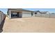 Spacious backyard with block wall and covered patio ready for customization at 4513 W 95Th Dr, Tolleson, AZ 85353
