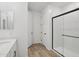 Modern bathroom with a glass shower, tile flooring, and a toilet stall for privacy at 4513 W 95Th Dr, Tolleson, AZ 85353