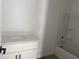 Bathroom features a vanity with sink and a bathtub at 4513 W 95Th Dr, Tolleson, AZ 85353