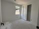 Bedroom featuring a window, closet space and natural light at 4513 W 95Th Dr, Tolleson, AZ 85353