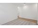 Well-lit bedroom with neutral walls and flooring provides a serene space at 4513 W 95Th Dr, Tolleson, AZ 85353
