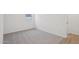 Bright bedroom with neutral carpet and a window for natural light at 4513 W 95Th Dr, Tolleson, AZ 85353