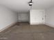 Spacious garage with ample room for parking and storage, offering functionality at 4513 W 95Th Dr, Tolleson, AZ 85353