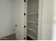 Linen closet offers ample storage space for linens and other household essentials at 4513 W 95Th Dr, Tolleson, AZ 85353