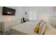 Bright bedroom with white accents, a sleek desk, and minimalist decor at 4754 N 14Th St, Phoenix, AZ 85014