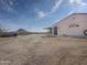 Exterior view of white home with desert landscaping at 48822 N Roughrider Rd, New River, AZ 85087