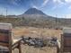 Views from the property featuring a mountain backdrop and tranquil outdoor seating at 48822 N Roughrider Rd, New River, AZ 85087