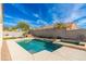 Inviting pool with a spa, an outdoor kitchen, a patio, and an expansive backyard at 4887 E Armor St, Cave Creek, AZ 85331