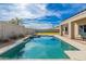 Beautiful backyard pool with a diving platform and spa, perfect for relaxation and entertaining at 4887 E Armor St, Cave Creek, AZ 85331