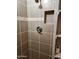 Shower features tiled walls with a built in niche at 510 N Alma School Rd # 103, Mesa, AZ 85201