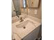 Bathroom features a modern vanity with a white marble countertop at 510 N Alma School Rd # 103, Mesa, AZ 85201