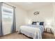 Comfortable bedroom with a large window and soft natural light at 5217 E Emery Rd, San Tan Valley, AZ 85143