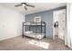 Bedroom with bunk beds, natural light, and a view of a walk-in closet at 5460 S Dillon Cir, Mesa, AZ 85212