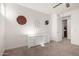 Bedroom featuring a dresser, carpet, and sports-themed decor on the walls at 5460 S Dillon Cir, Mesa, AZ 85212