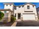 Charming two-story home featuring an attached two-car garage and manicured landscaping at 5460 S Dillon Cir, Mesa, AZ 85212