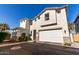 Charming two-story home featuring an attached two-car garage and well-maintained landscaping at 5460 S Dillon Cir, Mesa, AZ 85212