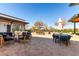 Community outdoor seating area with tables, lounge furniture, and relaxing ambiance at 5460 S Dillon Cir, Mesa, AZ 85212