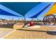 Vibrant playground offers various activities, including climbing structures and a covered play area at 5460 S Dillon Cir, Mesa, AZ 85212