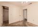 Bedroom features a closet and neutral walls at 6132 E Casper St, Mesa, AZ 85205