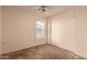 Bedroom featuring a closet and a window at 6132 E Casper St, Mesa, AZ 85205