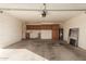 Spacious garage includes storage cabinets and a water heater at 6132 E Casper St, Mesa, AZ 85205