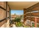 Scenic balcony view featuring lush greenery, vibrant foliage and distant mountain silhouettes at 7147 E Rancho Vista Dr # 6011, Scottsdale, AZ 85251