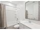 Bathroom featuring tub, shower and single sink with quartz countertops and decorative framed mirror at 7165 S Bruins Rd, Gold Canyon, AZ 85118