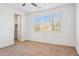 Bedroom featuring carpet, neutral paint, ceiling fan, window with blinds, and closet at 7165 S Bruins Rd, Gold Canyon, AZ 85118