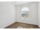 Neutral bedroom with arched window features neutral carpeting at 7165 S Bruins Rd, Gold Canyon, AZ 85118