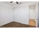 Bedroom with closet and views into the hallway at 7165 S Bruins Rd, Gold Canyon, AZ 85118